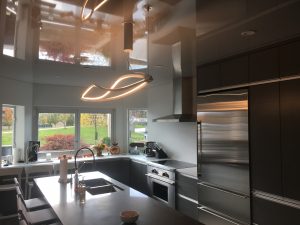 Kitchen with high gloss Stretch Ceiling